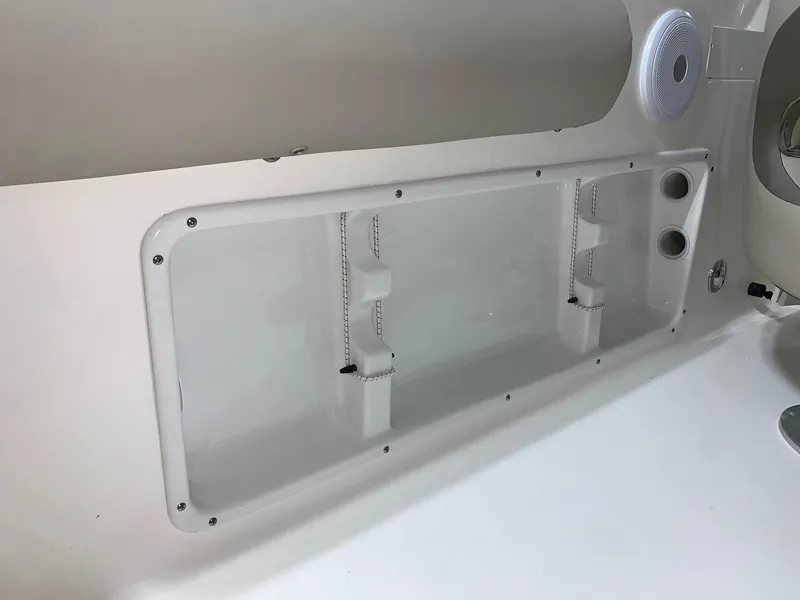 Slide: The Image of 2024 Key West 203 DFS boat storage compartment and speaker. - 11