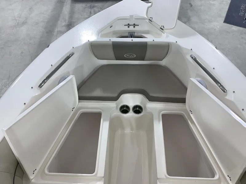 Slide: The Image of 2024 Key West 203 DFS boat bow seating with storage compartments. - 5