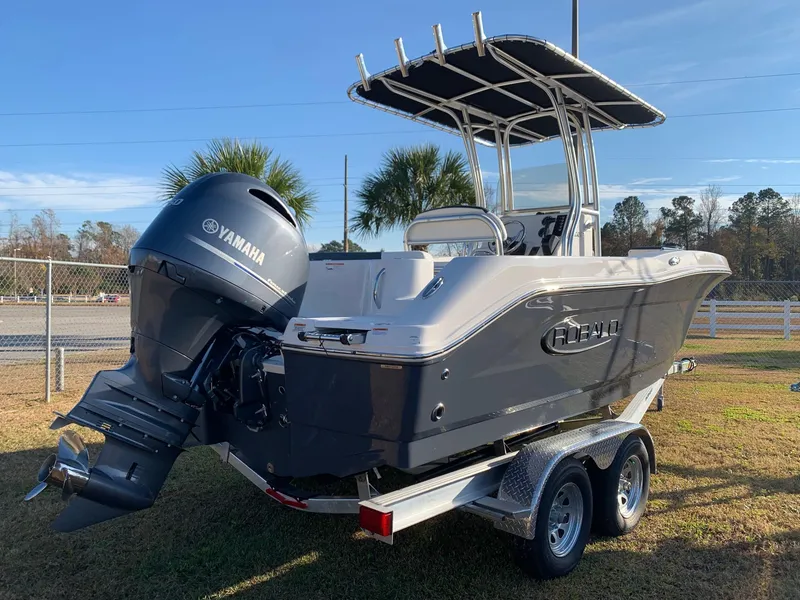 Slide: The Image of 2024 Robalo R202 Explorer boat with Yamaha outboard motor on trailer. - 3