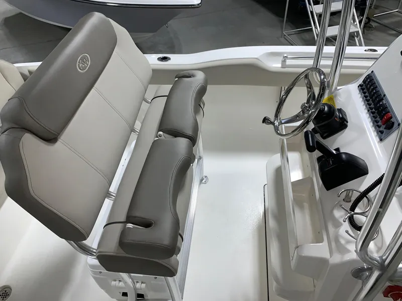 Slide: The Image of 2024 Key West 219 FS boat interior with helm and seating. - 18