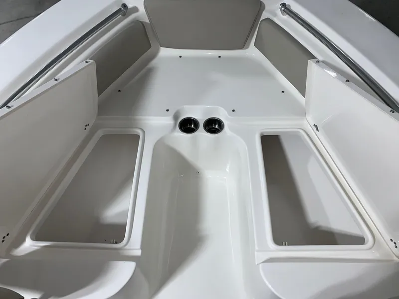 Slide: The Image of 2024 Key West 219 FS boat interior with open storage compartments. - 22