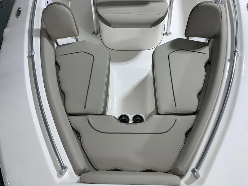 Slide: The Image of 2024 Key West 219 FS boat interior seating area with cushioned seats. - 25