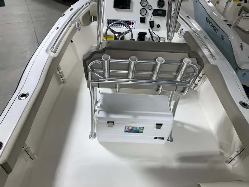 Slide: The Image of 2024 Key West 219 FS boat interior with console and seating. - 3
