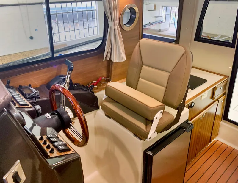 Slide: The Image of 2021 Ranger Tugs R-25 - Helm station - 16