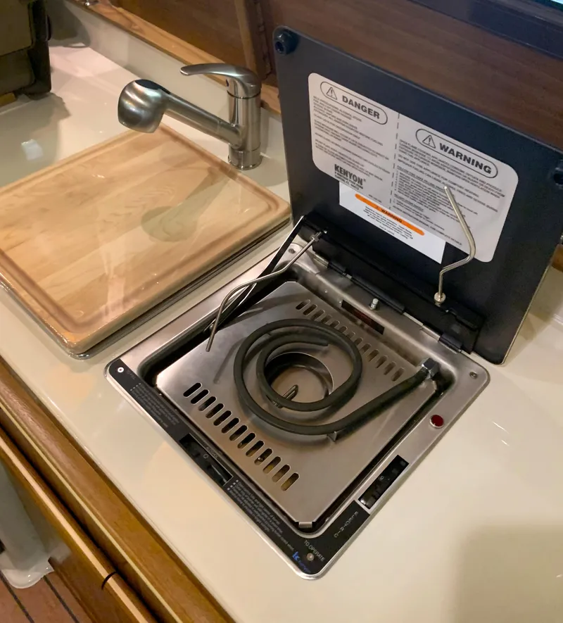 Slide: The Image of 2021 Ranger Tugs R-25 - Sink and electric stove - 20