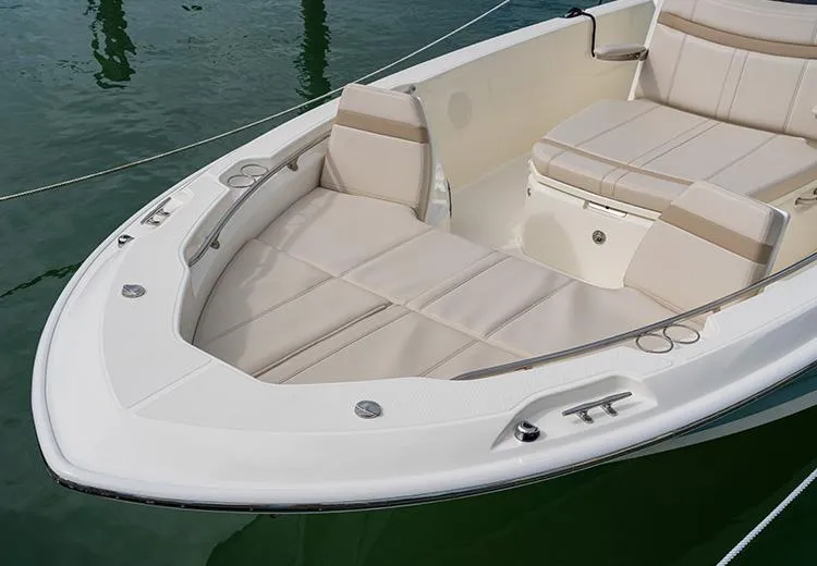Slide: The Image of 2023 Boston Whaler 250 Dauntless boat with spacious seating and sleek design. - 6