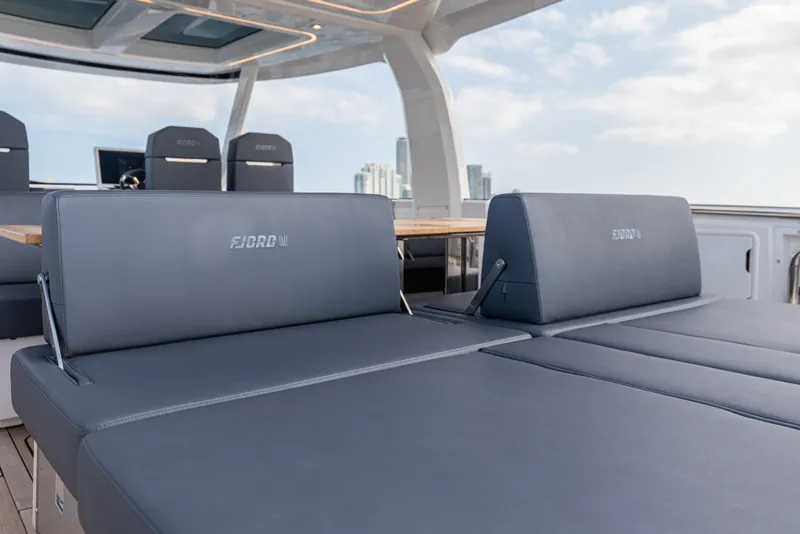Slide: The Image of 2024 Fjord 41 XL yacht interior with luxurious seating and modern design. - 32