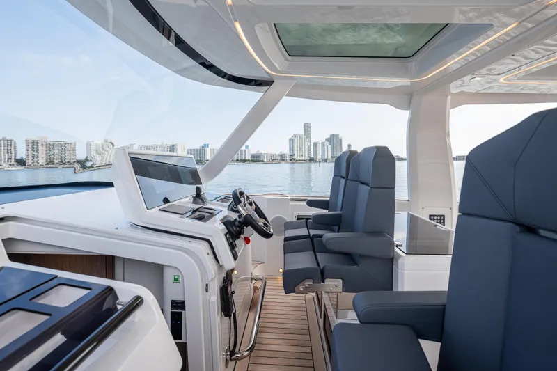 Slide: The Image of Luxurious interior of 2024 Fjord 41 XL yacht with city skyline view. - 35