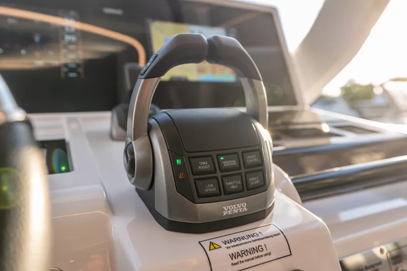 Slide: The Image of Control panel of 2024 Fjord 41 XL boat featuring Volvo Penta throttle system. - 38