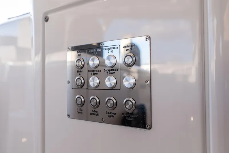 Slide: The Image of Control panel on 2024 Fjord 41 XL yacht, featuring various lighting and table adjustments. - 41