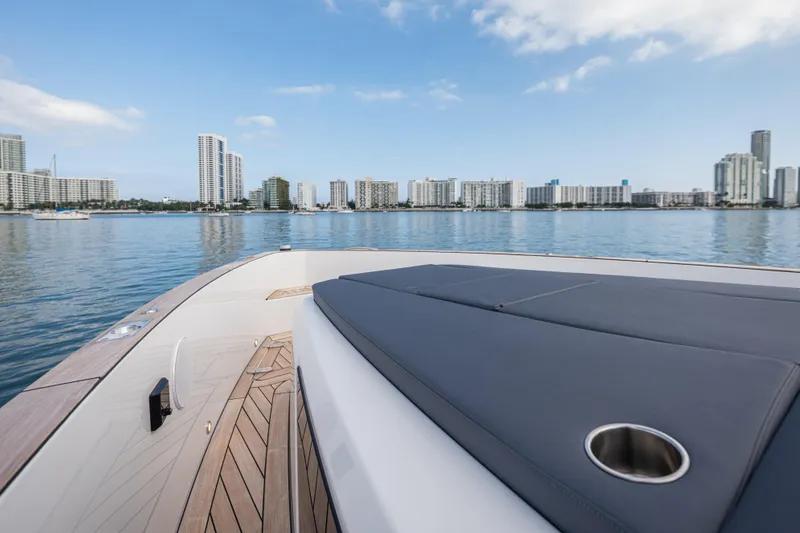 Slide: The Image of 2024 Fjord 41 XL yacht deck with city skyline in the background. - 42