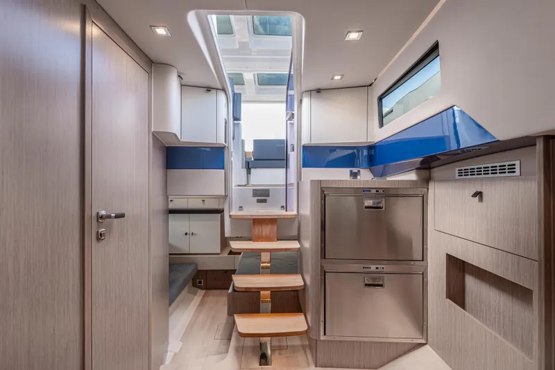 Slide: The Image of Luxurious interior of 2024 Fjord 41 XL yacht, featuring modern design and sleek cabinetry. - 46