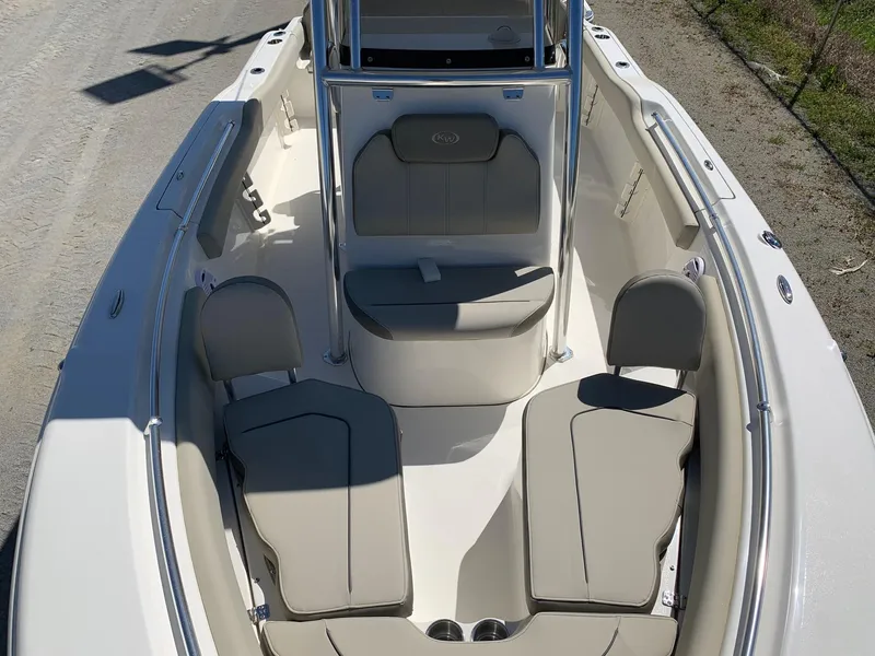 Slide: The Image of 2024 Key West 219 FS boat interior with cushioned seating. - 16