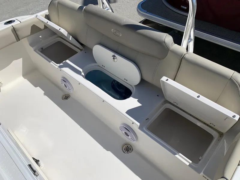 Slide: The Image of 2024 Key West 219 FS boat seating and storage compartments. - 9