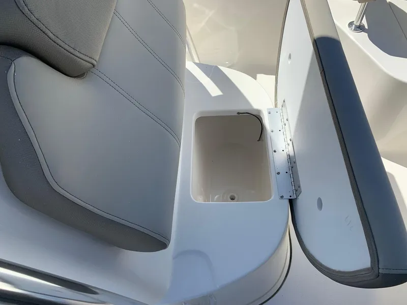 Slide: The Image of 2024 Key West 219 FS boat seat with storage compartment. - 12