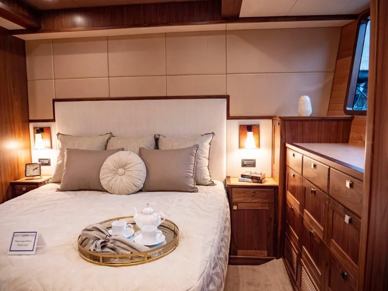 Slide: The Image of Luxurious bedroom interior of 2025 Northern Marine 57 Expedition yacht. - 13