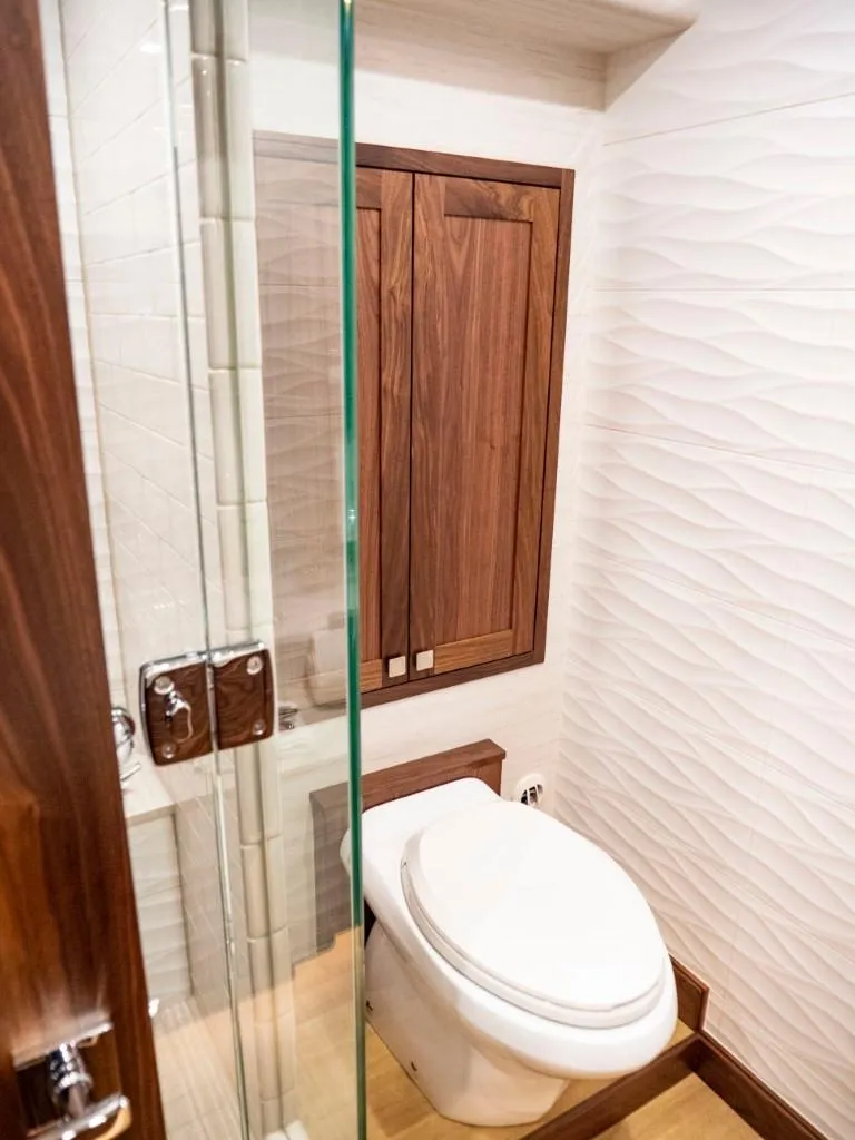 Slide: The Image of 2025 Northern Marine 57 Expedition yacht bathroom with modern design and wooden cabinetry. - 16