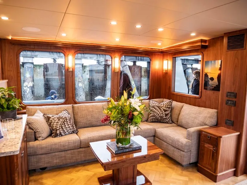 Slide: The Image of Luxurious interior of 2025 Northern Marine 57 Expedition yacht with cozy seating and elegant decor. - 2