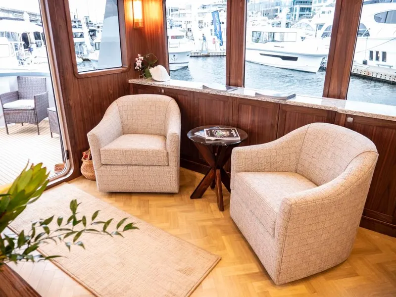 Slide: The Image of Interior of 2025 Northern Marine 57 Expedition yacht with cozy seating area. - 34