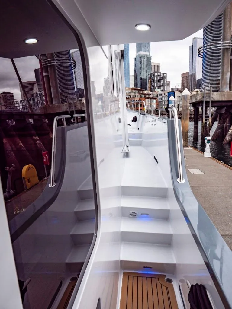 Slide: The Image of 2025 Northern Marine 57 Expedition yacht docked at a modern marina. - 36