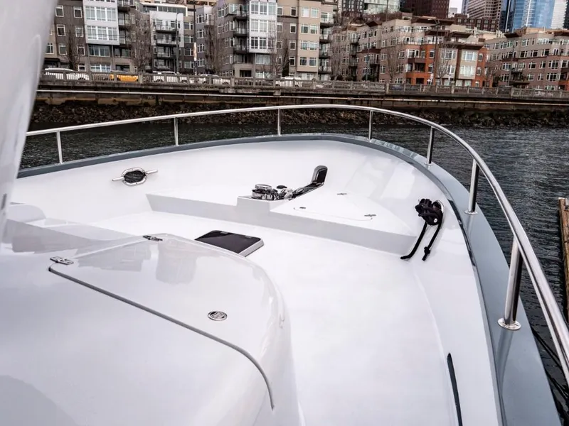 Slide: The Image of 2025 Northern Marine 57 Expedition yacht bow with cityscape background. - 37