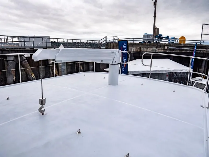 Slide: The Image of Northern Marine 57 Expedition 2025 yacht deck with crane in a marina. - 40