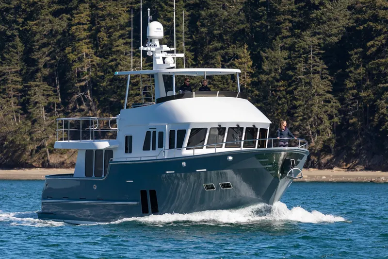 Slide: The Image of 2025 Northern Marine 57 Expedition yacht cruising on a scenic waterway. - 5