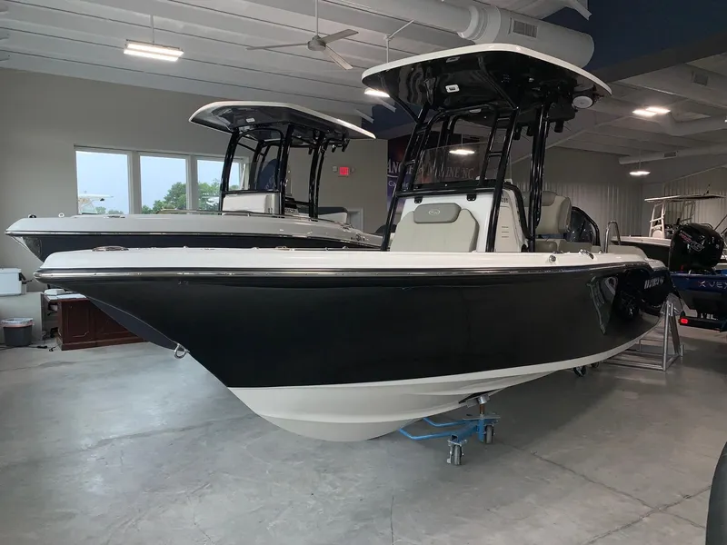Slide: The Image of 2024 Key West 219 FS boat in showroom. - 1