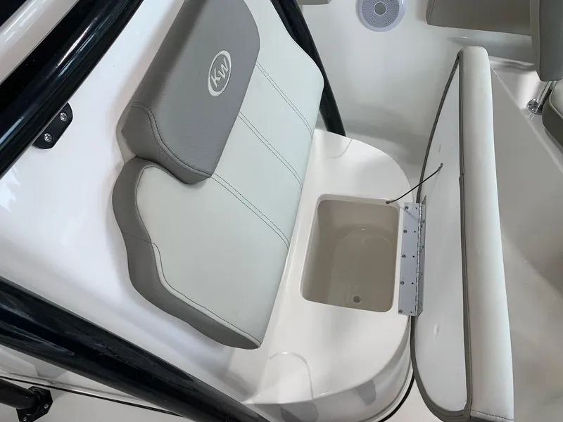 Slide: The Image of 2024 Key West 219 FS boat seat with storage compartment. - 14