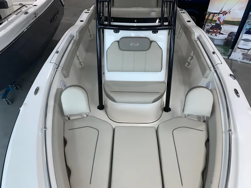 Slide: The Image of 2024 Key West 219 FS boat interior with cushioned seating and sleek design. - 3