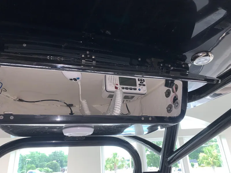 Slide: The Image of 2024 Key West 219 FS boat electronics and control panel. - 7