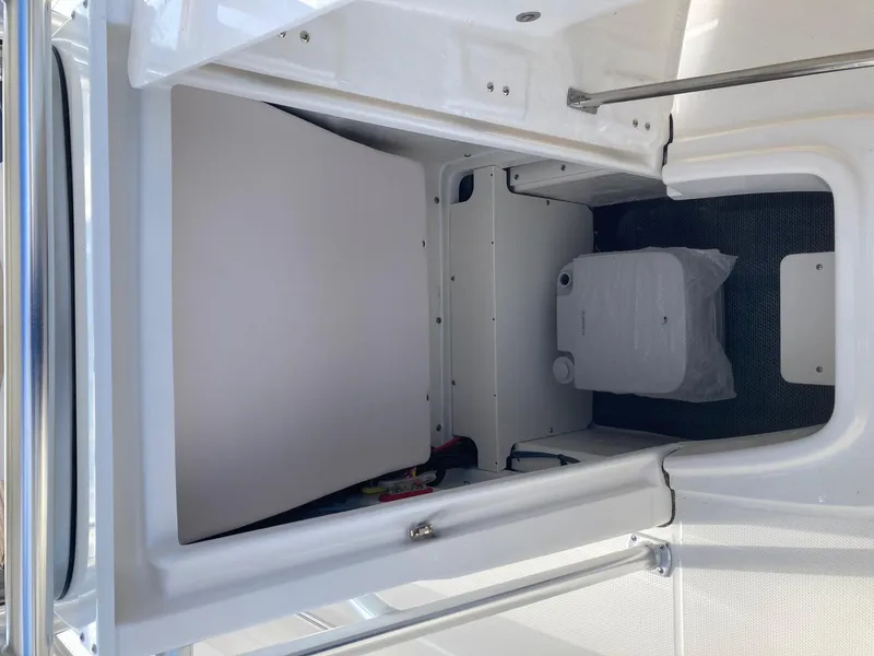 Slide: The Image of 2024 Robalo R200 Center Console interior storage compartment. - 14