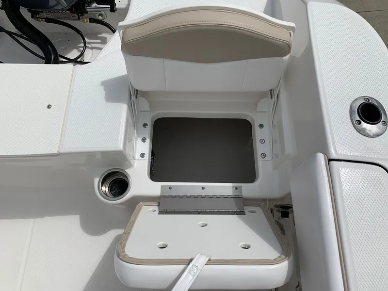 Slide: The Image of 2024 Robalo R200 Center Console boat seat with storage compartment. - 17