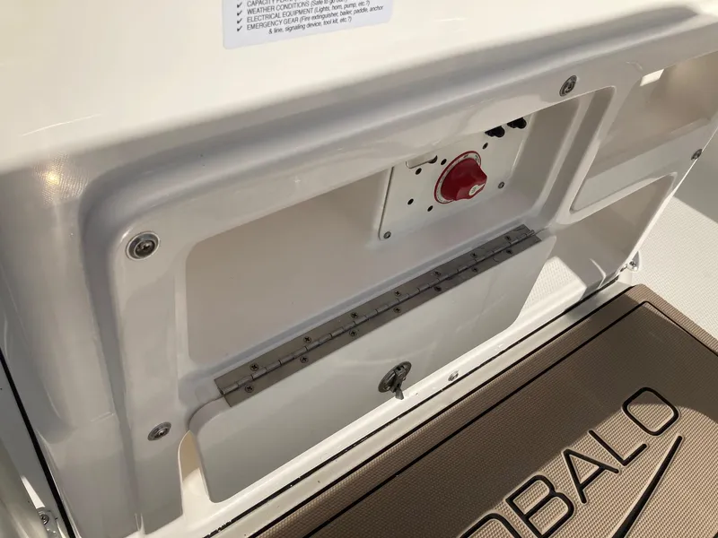 Slide: The Image of 2024 Robalo R200 Center Console boat interior detail with storage compartment. - 8