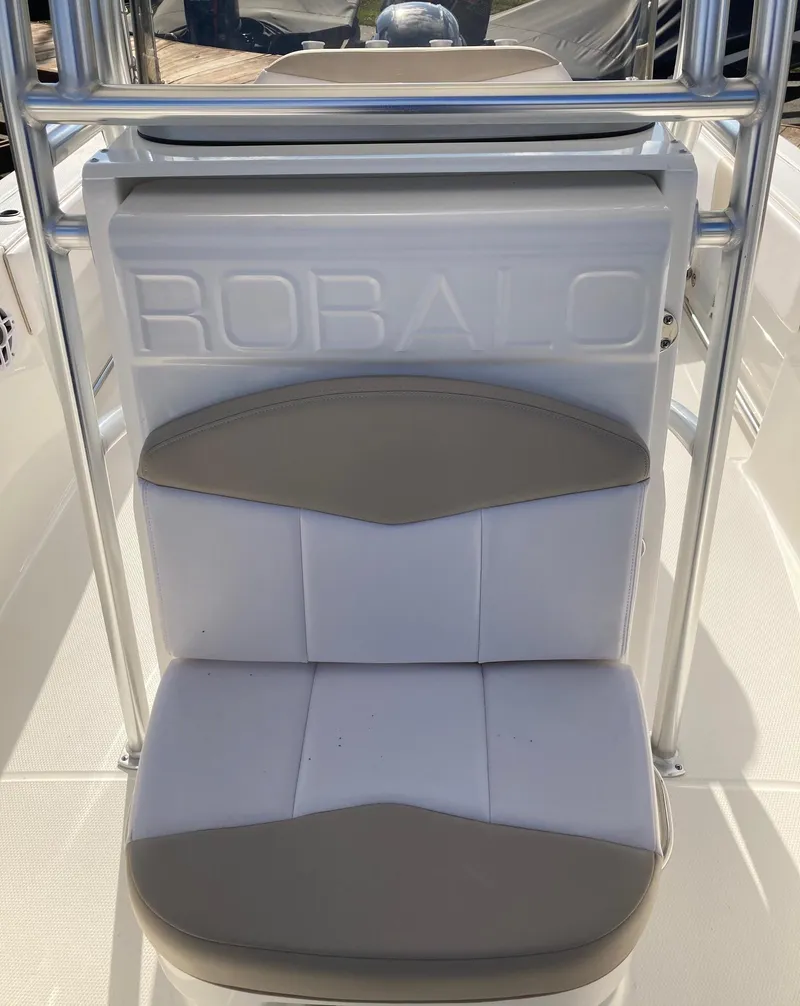 Slide: The Image of 2024 Robalo R200 Center Console boat seat with logo. - 12