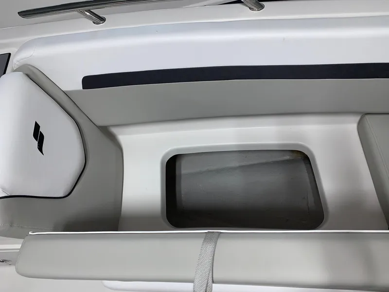 Slide: The Image of 2024 Starcraft SVX 191 boat interior seating and storage compartment. - 12