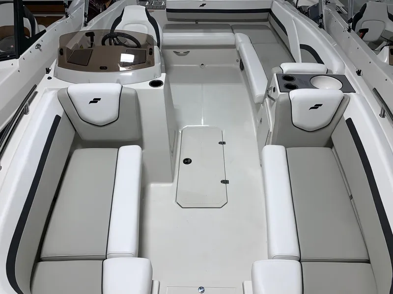 Slide: The Image of 2024 Starcraft SVX 191 boat interior with white and gray seating. - 14