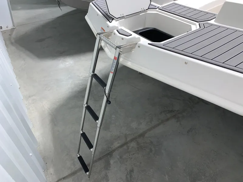 Slide: The Image of 2024 Starcraft SVX 191 boat with a foldable boarding ladder. - 4