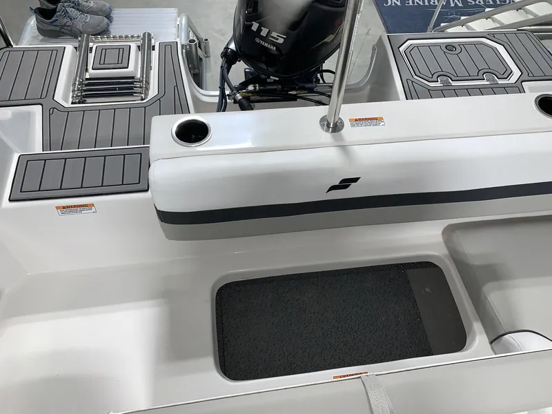 Slide: The Image of 2024 Starcraft SVX 191 boat interior with 115 HP outboard motor. - 7