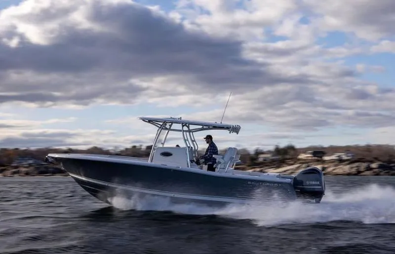 The Image of 2024 Southport 27 boat cruising on water under cloudy sky. - 1