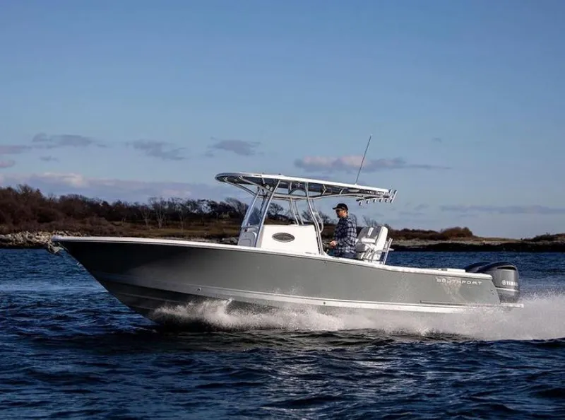 Slide: The Image of 2024 Southport 27 boat cruising on open water. - 6