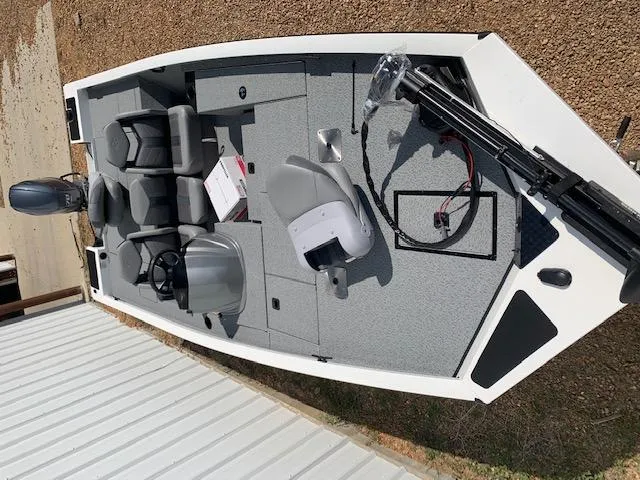 Slide: The Image of 2021 G3 Sportsman 1710 PFX fishing boat with seating and motor. - 2