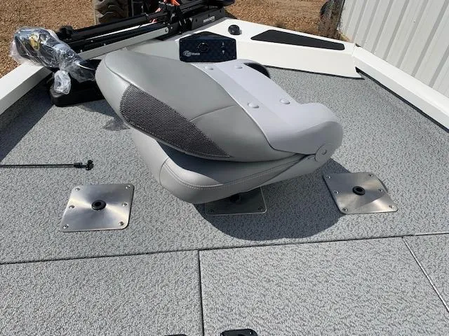 Slide: The Image of 2021 G3 Sportsman 1710 PFX boat seat on gray deck. - 7