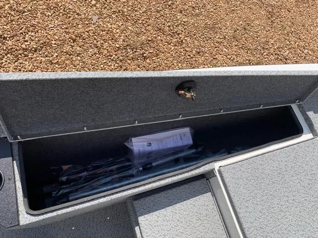 Slide: The Image of 2021 G3 Sportsman 1710 PFX storage compartment with fishing gear. - 8