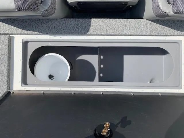 Slide: The Image of 2021 G3 Sportsman 1710 PFX boat storage compartment with bucket. - 9