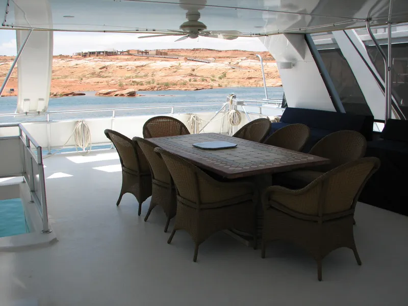 Slide: The Image of Luxury yacht Custom The Entourage Shares 20 & 35, 2005 model, docked at marina. - 14