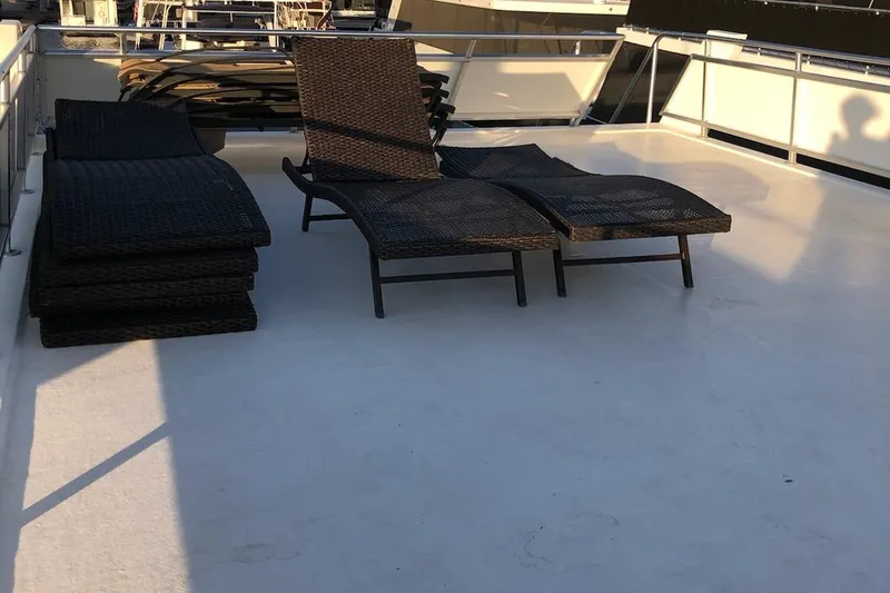 Slide: The Image of Top deck of 2005 Custom The Entourage Shares 20 & 35 houseboat. - 16