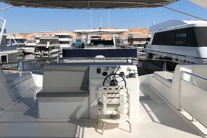 Slide: The Image of Sun deck with lounge chairs on Custom The Entourage Shares 20 & 35 yacht, 2005 model. - 18