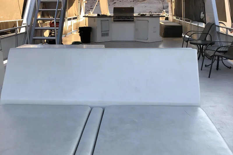 Slide: The Image of Outdoor kitchen on a 2005 Custom The Entourage Shares 20 & 35 boat. - 21