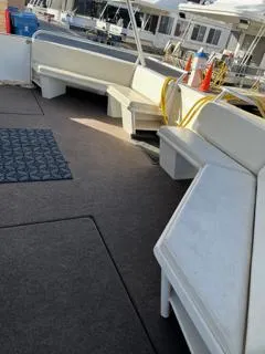 Slide: The Image of Custom 2005 The Entourage Shares 20 & 35 yacht deck with lounge chairs under clear sky. - 30